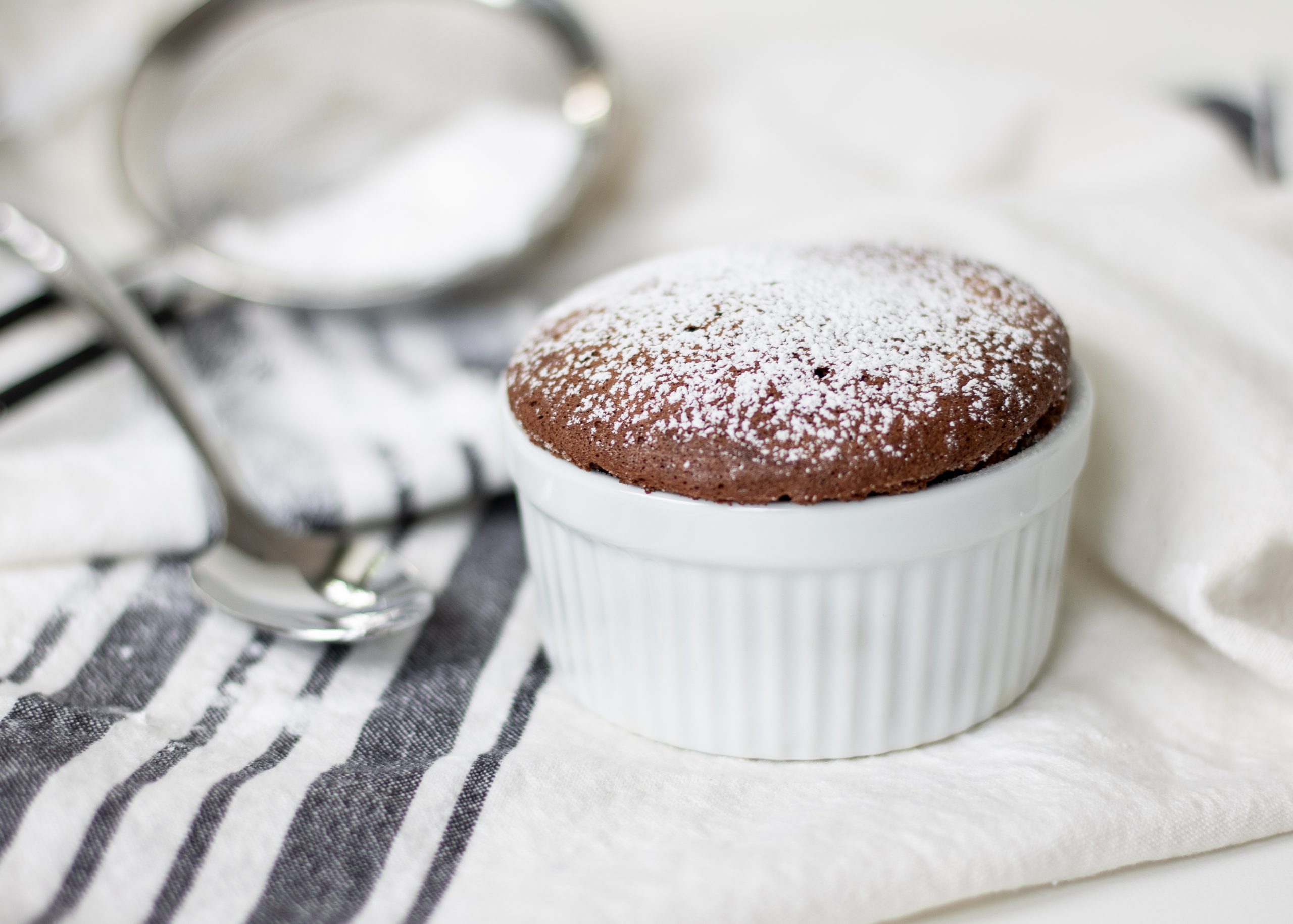 chocolate souffle with powdered sugar on top