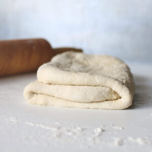 side view of folded rough pastry dough