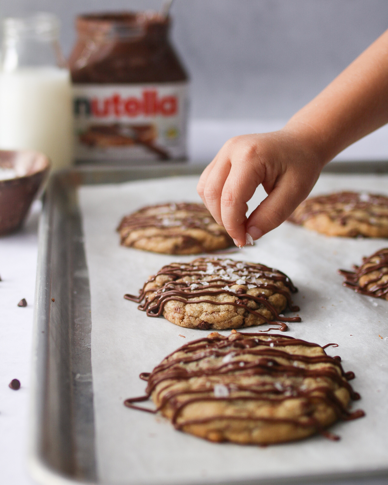 cookie sheet with nutella stuffed brown butter cookies