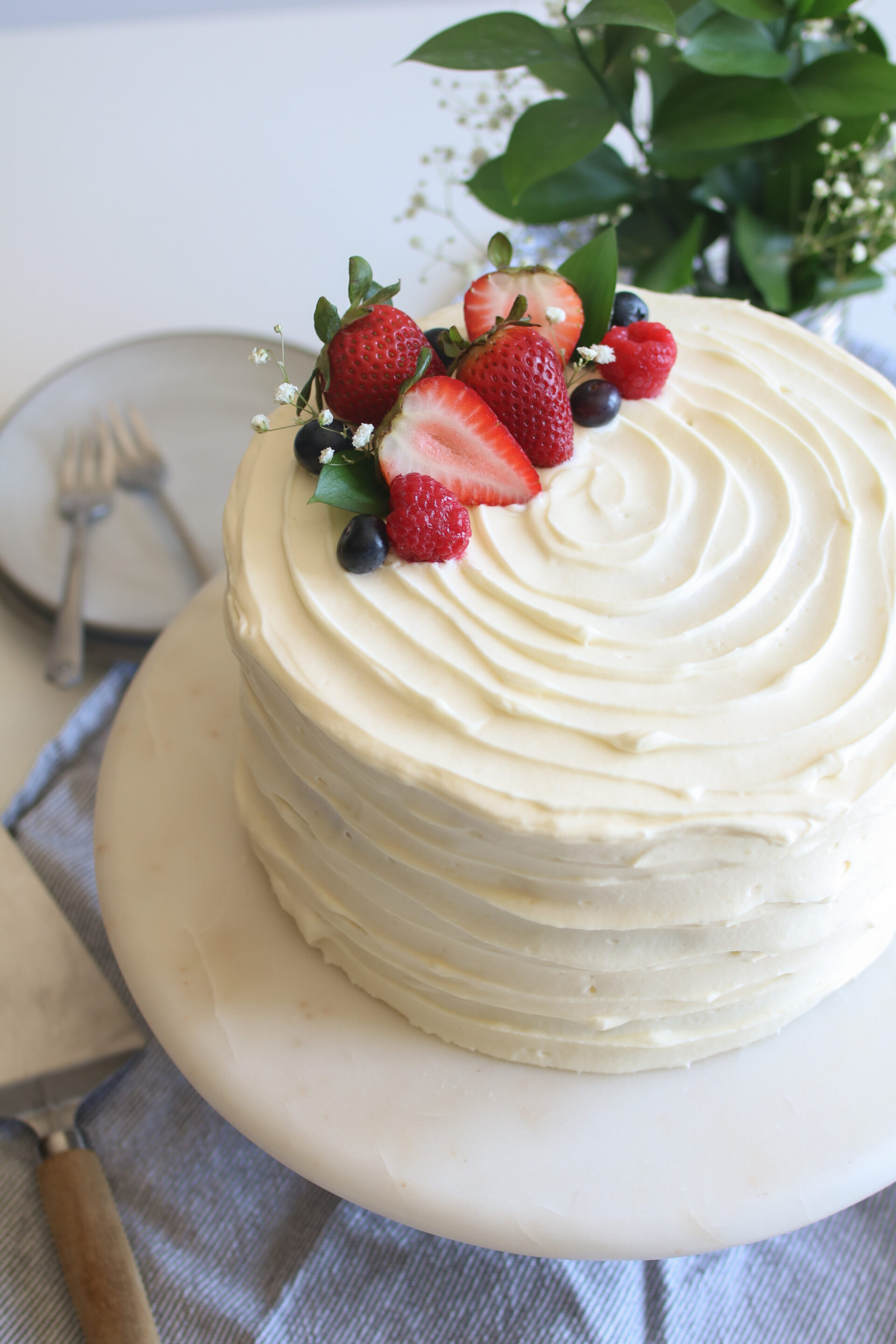 white chocolate berries and cream cake