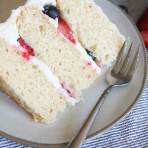 berries and cream cake slice close up