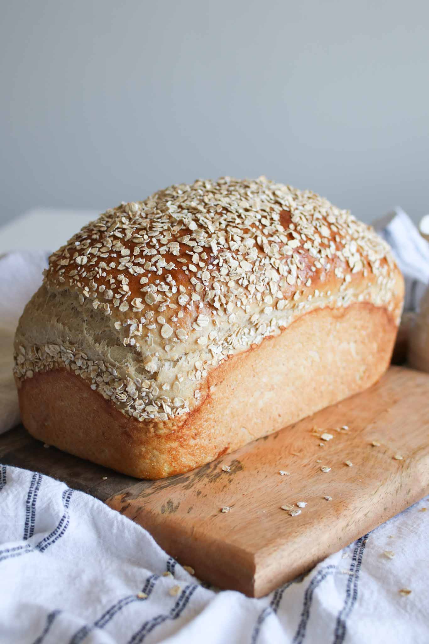 loaf of honey oat sourdough bread